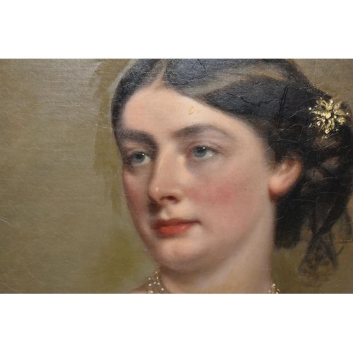 296 - ATTRIBUTED TO RICHARD BUCKNER (BRITISH, 1812-1882) Three quarter length portrait of a lady wearing a... 