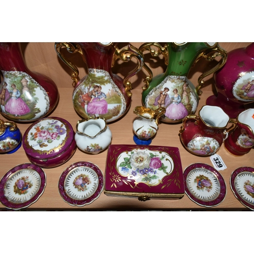 329 - A COLLECTION OF LIMOGES PORCELAIN, to include La Reine, Limoges Castel, etc., vases, trinket boxes, ... 