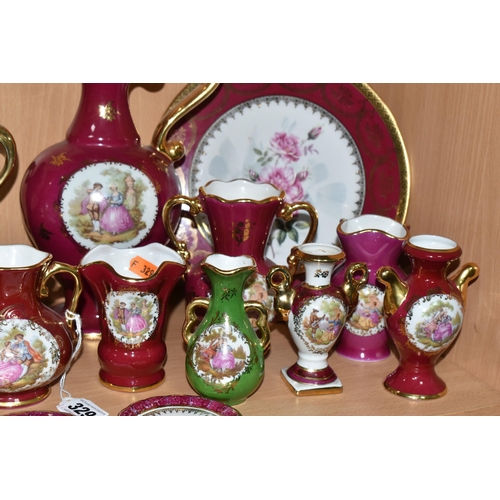 329 - A COLLECTION OF LIMOGES PORCELAIN, to include La Reine, Limoges Castel, etc., vases, trinket boxes, ... 