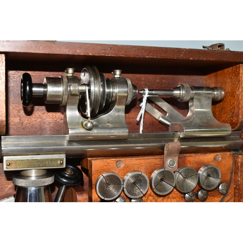 343 - A WATCHMAKER'S LATHE, by Ime of London, in a fitted wooden case with instructions and accessories, c... 