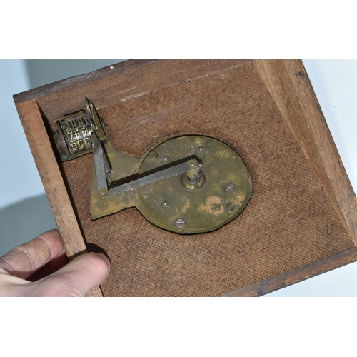 344 - A SCRATCHBUILT DISK CIPHER/CODING MACHINE, with four wheels of letters and numbers, on an angled woo... 