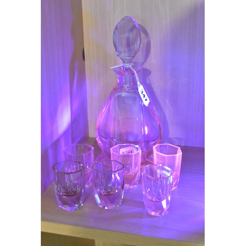 347 - AN ART DECO STYLE CZECH/BOHEMIAN GLASS DECANTER AND GLASSES, the decanter of faceted footed form wit... 