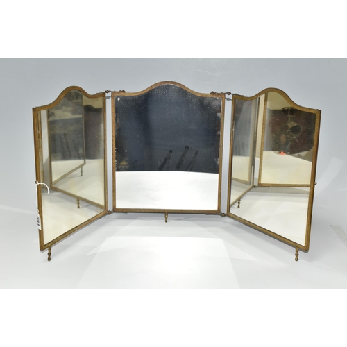 351 - AN EARLY TWENTIETH CENTURY TRIPTYCH DRESSING TABLE MIRROR, by JB Brevete, with two early plastic pan... 