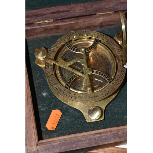 358 - BRASS NAUTICAL STYLE INSTRUMENTS, comprising two reproduction Brunton style transit compasses, a rep... 