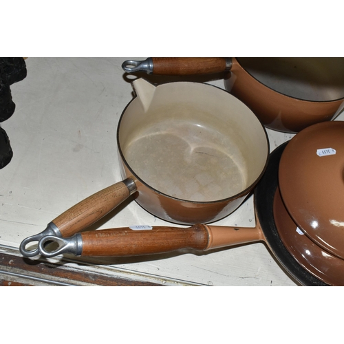 360 - THREE LE CREUSET CAST IRON COOKWARES, comprising 20cm and 22cm saucepans with lids and a 26cm frying... 