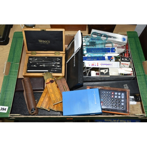 394 - A BOX OF CASED AND LOOSE TECHNICAL DRAWING EQUIPMENT, ETC, including six wooden Rabone rulers, one f... 