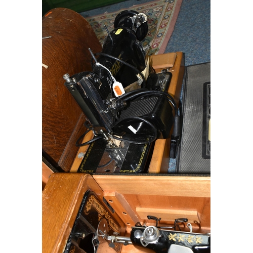 399 - THREE CASED SEWING MACHINES AND A PFAFF ELECTRIC SEWING MACHINE ON A WOODEN BASE AND TWO BOXES OF HA... 