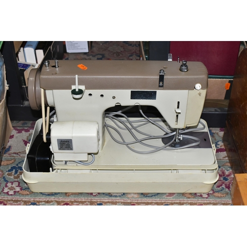 399 - THREE CASED SEWING MACHINES AND A PFAFF ELECTRIC SEWING MACHINE ON A WOODEN BASE AND TWO BOXES OF HA... 