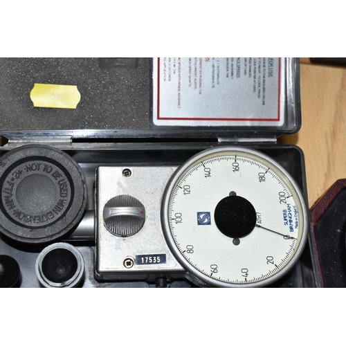 404 - THREE CASED R.P.M. METERS, two by Smiths Industries, the other by Superb of Birmingham, all in used ... 