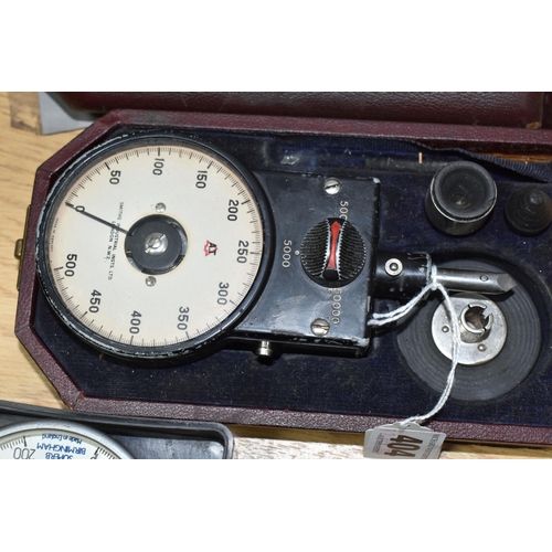 404 - THREE CASED R.P.M. METERS, two by Smiths Industries, the other by Superb of Birmingham, all in used ... 