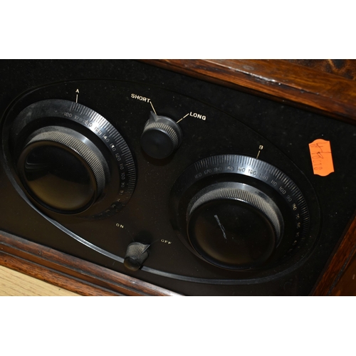 406 - AN OSRAM 'FOUR' NEW MUSIC MAGNET RADIO,  a Marconi radio, one other unmarked radio set and a wooden ... 