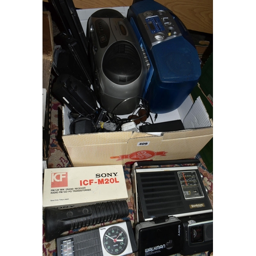 409 - A BOX OF PORTABLE RADIOS AND MUSIC PLAYERS ETC, to include a Sony ICF-M20L radio, Roberts R862 world... 