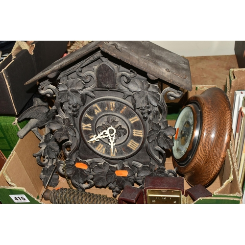 415 - TWO BOXES OF CLOCKS, BAROMETER AND LUSTRE LIGHT FITTING, comprising a cuckoo clock in need of a litt... 