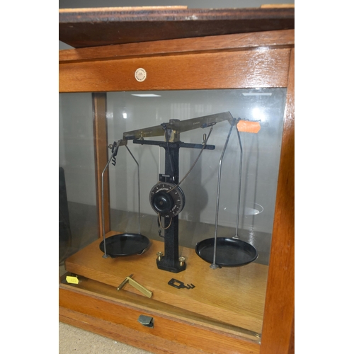 423 - THREE SETS OF SCIENTIFIC SCALES, comprising an Oertling model J10 set of scales with case (case in n... 