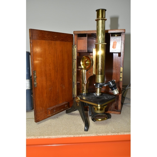 432 - A MONOCULAR COMPOUND MICROSCOPE OF BRASS CONSTRUCTION, impressed Henry Crouch London 8414 to the bas... 