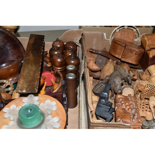 439 - THREE BOXES OF TREEN ITEMS, to include carved animals, Indian puzzle boxes in the form of a sleeping... 