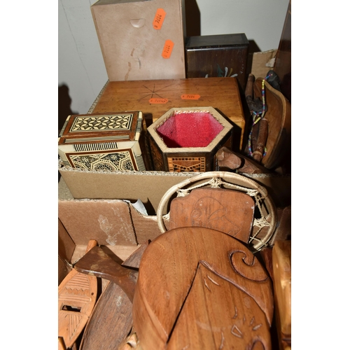 439 - THREE BOXES OF TREEN ITEMS, to include carved animals, Indian puzzle boxes in the form of a sleeping... 