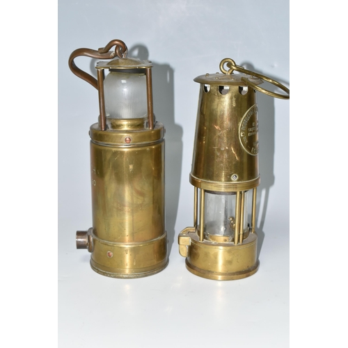 446 - TWO BRASS LAMPS, a McGeoch 0583 900-4090 brass lamp with looped hook handle, possibly a submarine/sh... 