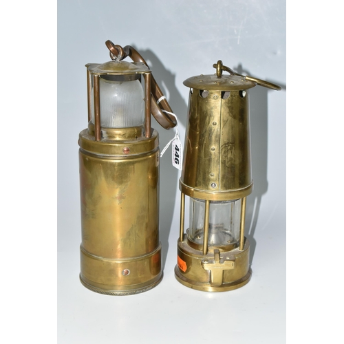 446 - TWO BRASS LAMPS, a McGeoch 0583 900-4090 brass lamp with looped hook handle, possibly a submarine/sh... 