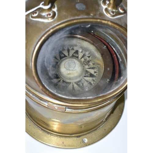 460 - A BRASS CASED BINNACLE COMPASS, marked Mercantile Stores Ltd to dial, the brass case with glass view... 