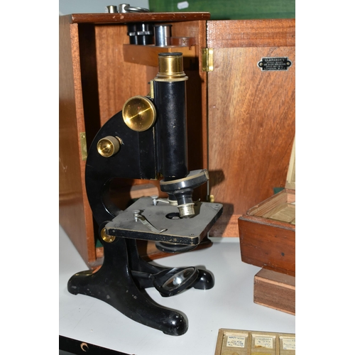 463 - A CASED MICROSCOPE AND VINTAGE PREPARED SLIDES, comprising a B & J Beck Ltd cased microscope, and tw... 