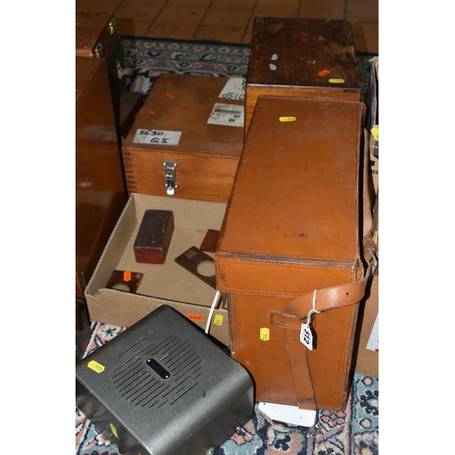 512 - A GROUP OF EMPTY WOODEN INSTRUMENT CASES, comprising seven assorted cases, a brown leather AVO case,... 