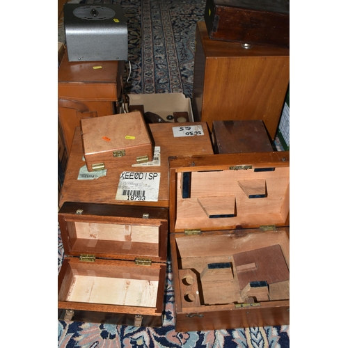 512 - A GROUP OF EMPTY WOODEN INSTRUMENT CASES, comprising seven assorted cases, a brown leather AVO case,... 