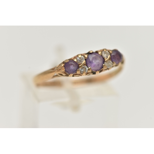 18 - A 9CT GOLD AMETHYST AND CUBIC ZIRCONIA RING, set with three circular cut amethysts, flanked with fou... 