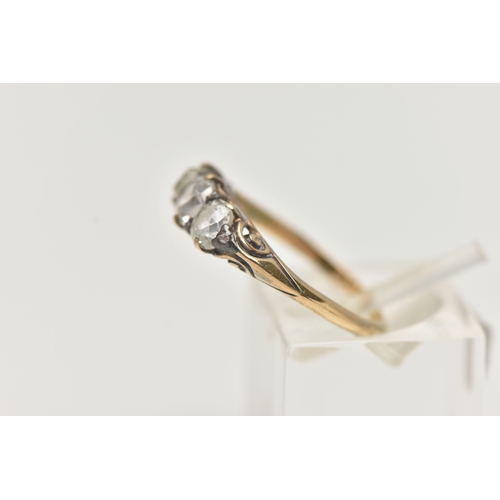 40 - A DIAMOND THREE STONE RING, set with slightly graduating old cut diamonds, the principal diamond mea... 