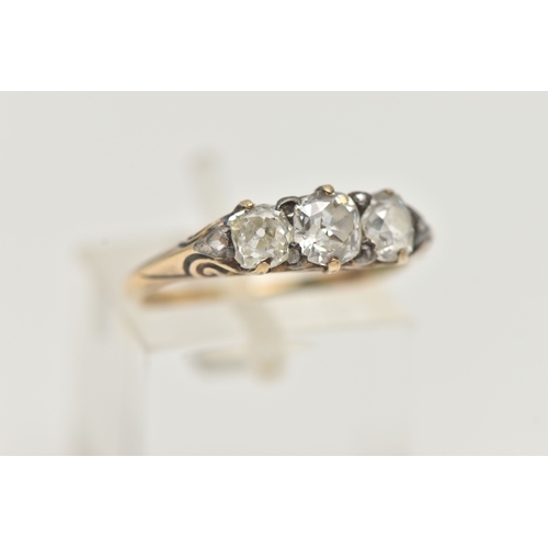 40 - A DIAMOND THREE STONE RING, set with slightly graduating old cut diamonds, the principal diamond mea... 