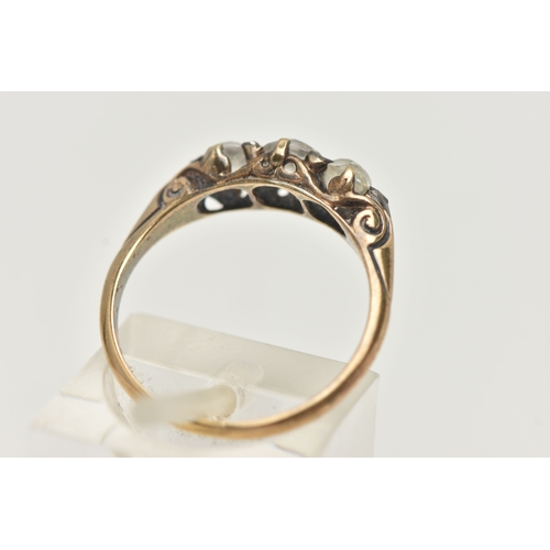 40 - A DIAMOND THREE STONE RING, set with slightly graduating old cut diamonds, the principal diamond mea... 