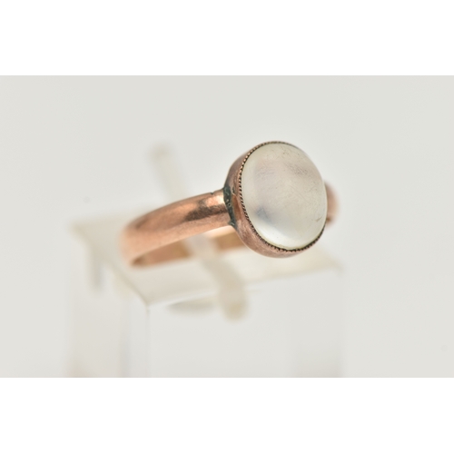 38 - A MOONSTONE SINGLE STONE RING, set with an oval moonstone cabochon, rub over set with millegrain bor... 