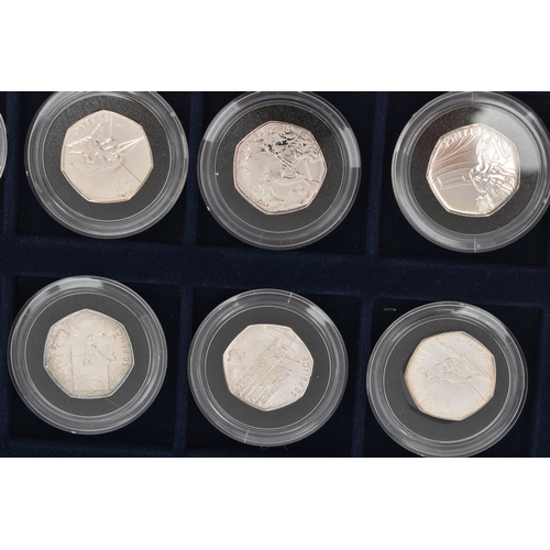 134 - A BOX OF ROYAL MINT COMMEMORATIVE SILVER 50 PENCE COINS, to include eleven coins, from the Olympic '... 