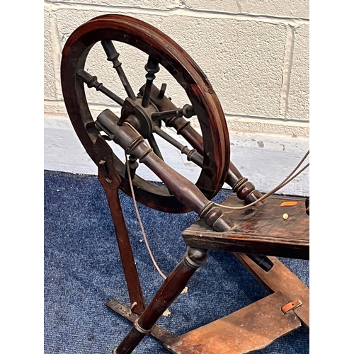 1259 - A VICTORIAN STAINED BEECH SPINNING WHEEL (condition report: leather strap broken to foot pedal, hist... 