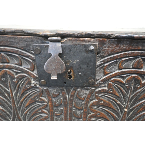 1307 - A GEORGIAN OAK BIBLE BOX, the hinged lid enclosing a candle box, once you remove a panel of wood, it... 