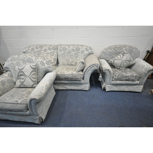 1313 - A PALE TEAL AND FLORAL UPHOLSTERED THREE PIECE SUITE, comprising a three seater sofa, length 220cm x... 