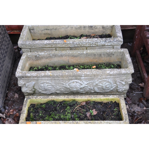 1007 - THREE RECTANGULAR COMPOSITE GARDEN PLANTERS one with brickwork effect and two stands width 77cm (3)