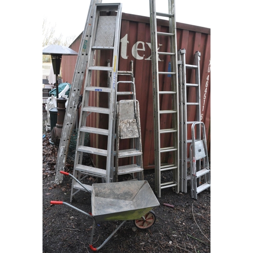 1014 - THREE SET OF ALUMINIUM STEP LADDERS AND A GALVANISED WHEEL BARROW the longest set brining 270cm high... 