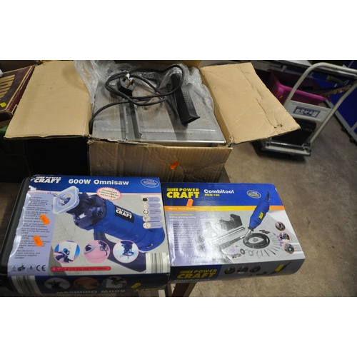 1097 - A BRAND NEW IN BOX POWER CRAFT OMNI SAW AND ROTARY TOOL along with a used Power Craft tile cutter (P... 