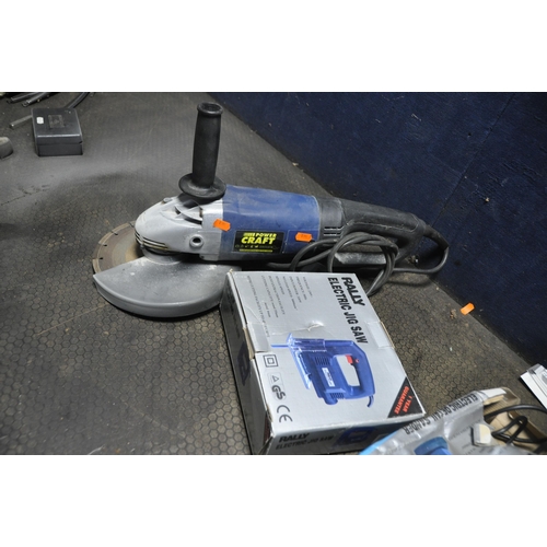 1102 - A POWER CRAFT 9in ANGLE GRINDER fitted with a concrete blade, a J&L 1in belt sander (both PAT pass a... 