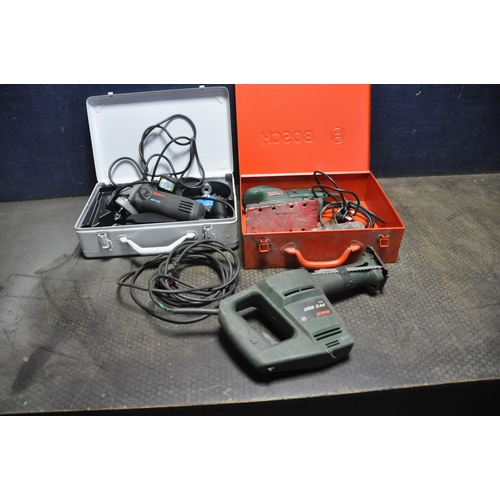 1104 - BOSCH POWER TOOLS comprising of a GWS 6-100 angle grinder in metal case, a PSS 240A sander in metal ... 