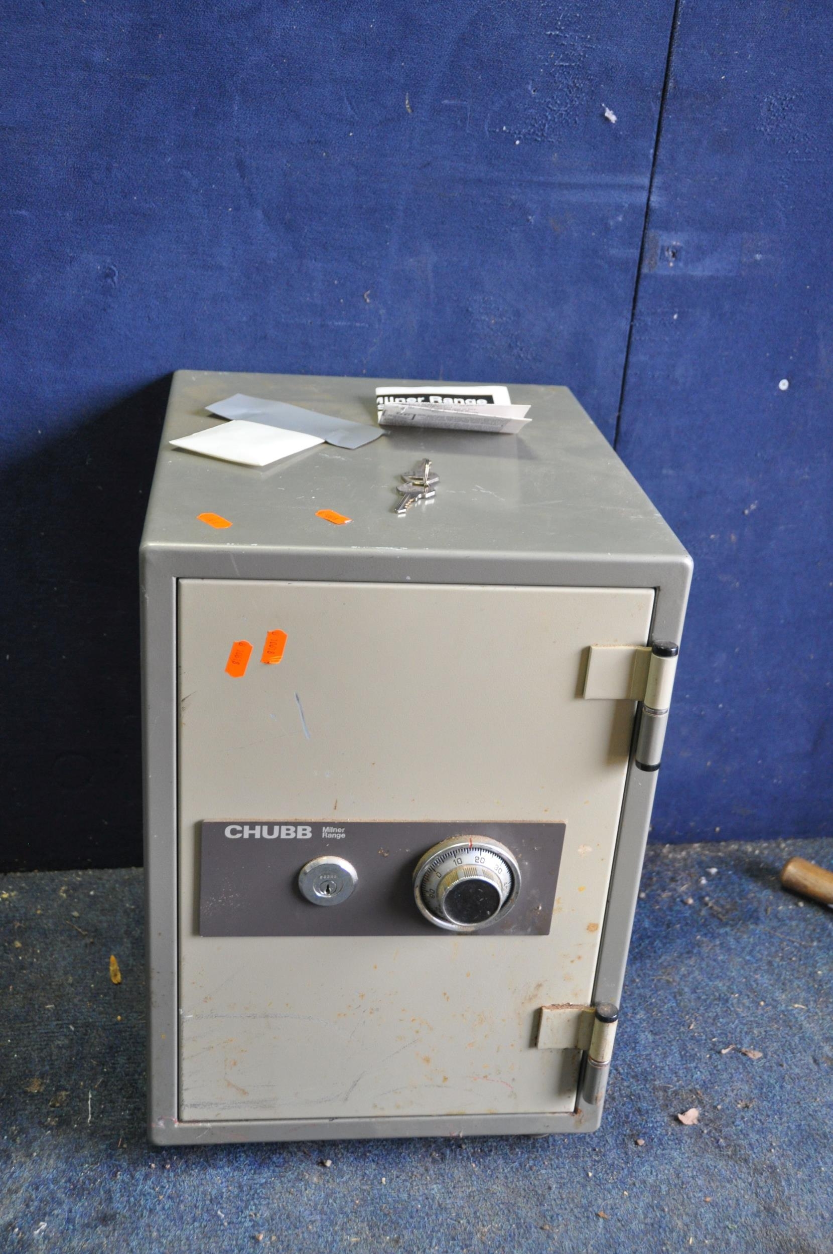 A CHUBB MILNER RANGE SAFE with two keys and instructions with code ...