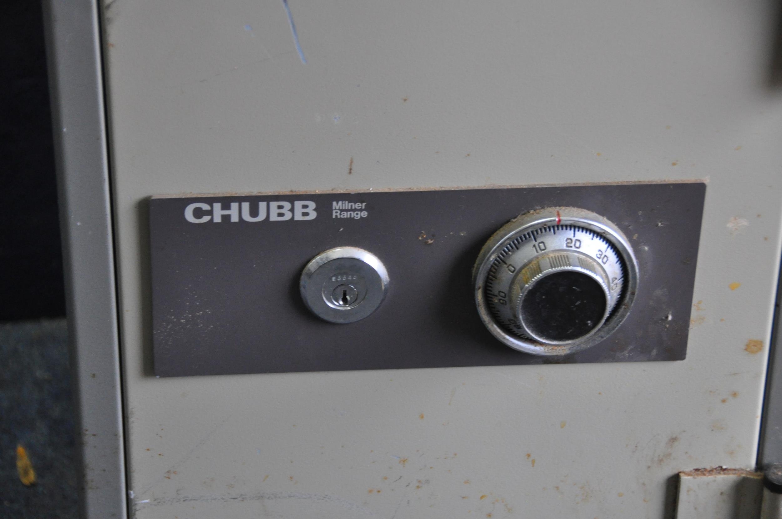 A CHUBB MILNER RANGE SAFE with two keys and instructions with code ...