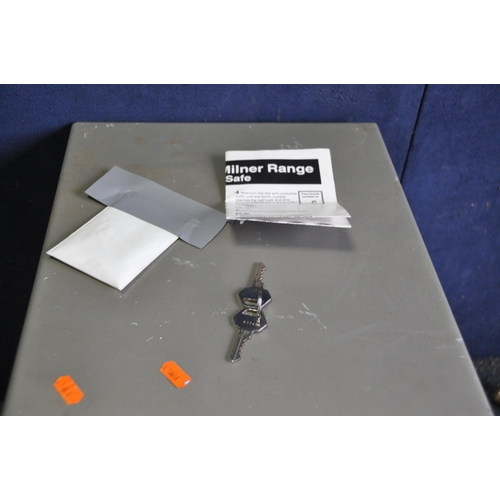 A CHUBB MILNER RANGE SAFE with two keys and instructions with code ...