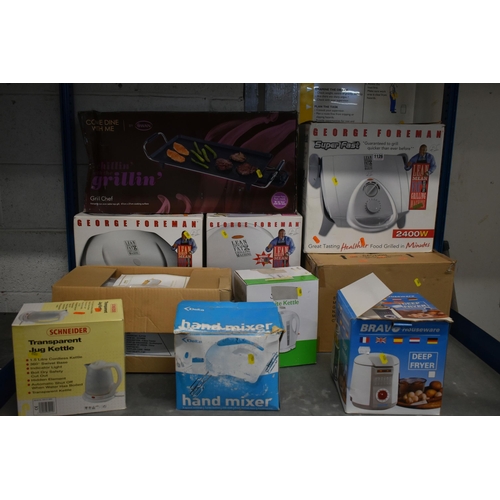 1126 - A SELECTION OF BOXED KITCHEN ELECTRICAL EQUIPMENT, to include three George Foreman grills, a Swan gr... 