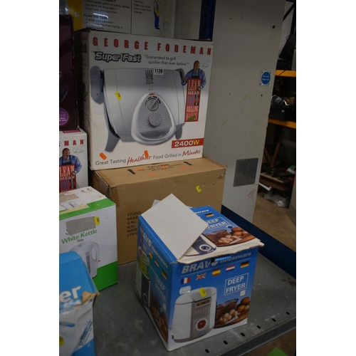 1126 - A SELECTION OF BOXED KITCHEN ELECTRICAL EQUIPMENT, to include three George Foreman grills, a Swan gr... 