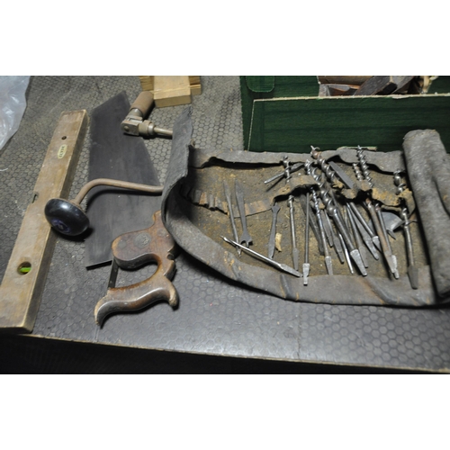 1157 - TWO TRAYS CONTAINING CARPENTRY TOOLS including a vintage Spiers steel footed plane, two back saws (o... 