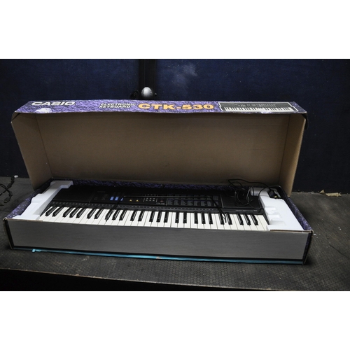 1158 - A CASIO CTK-530 ELECTRONIC KEYBOARD in box with Power supply and stand (PAT pass and working)