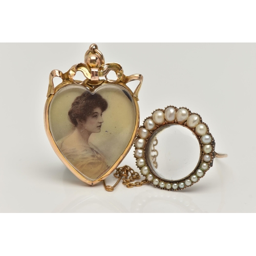 11 - TWO EARLY 20TH CENTURY JEWELLERY ITEMS, the first a heart form double sided photo pendant, with addi... 