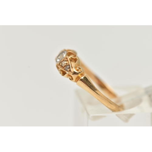 13 - AN 18CT GOLD DIAMOND RING, an old cut diamond bezel set with milgrain detail flanked with three sing... 